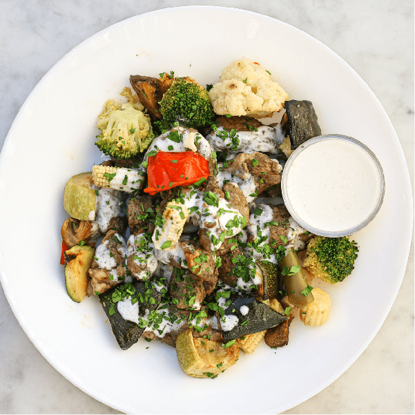 Roasted Lamb and Fall Vegetables with Garlic Sauce