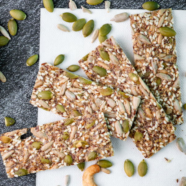 Multi-Seed Crackers with Spiced Bell Pepper Cream